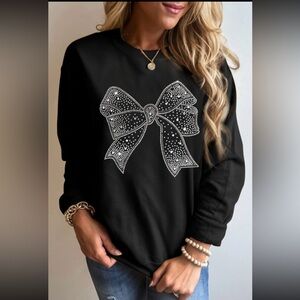 1118. Rhinestone bow crewneck sweatshirt in black